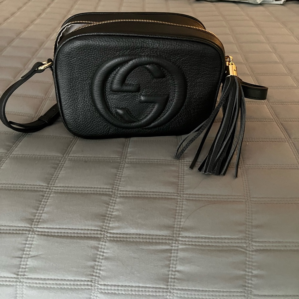Black Gucci pocket book